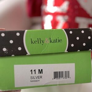 Women’s 11 M Silver Chrome strappy sandal heel. Kelly Katie Brand